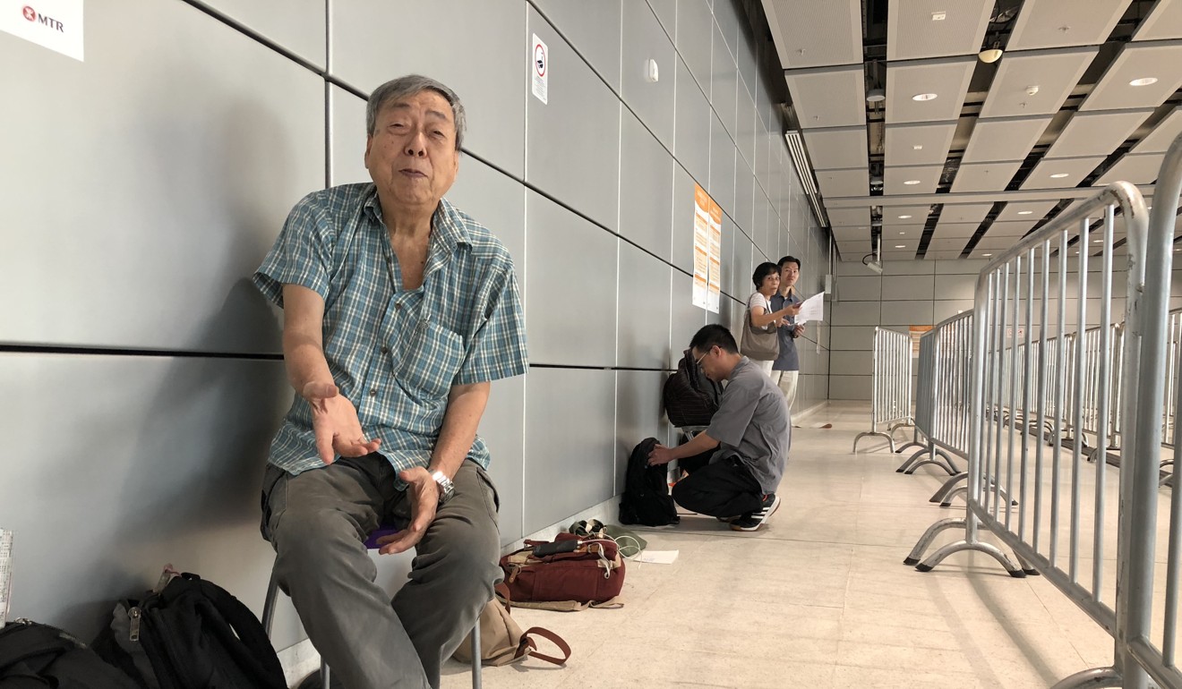 Retiree Johnny Leung Shing plans to travel with his family on the first train to Shenzhen North station. Photo: Denise Tsang