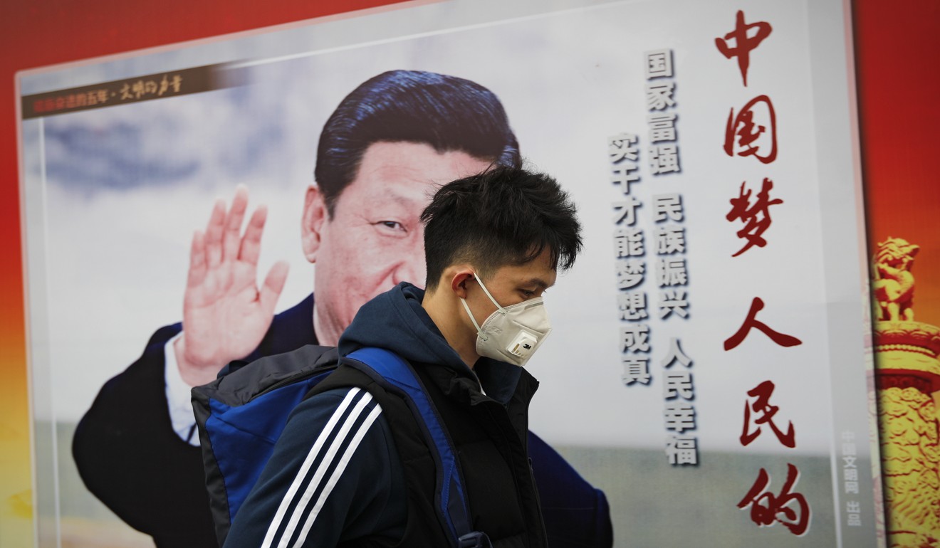 A poster in Beijing featuring Chinese President Xi Jinping and the words “China Dream, People Dream”. Photo: AP