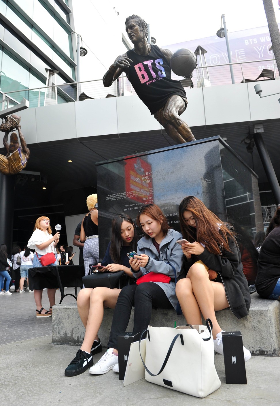 BTS fans Jie Yu, 18, Xiangning Li, 18, and Susu Zhang, 18, before the BTS concert in Los Angeles, California. Photo: Rachel Luna/Getty Images/AFP
