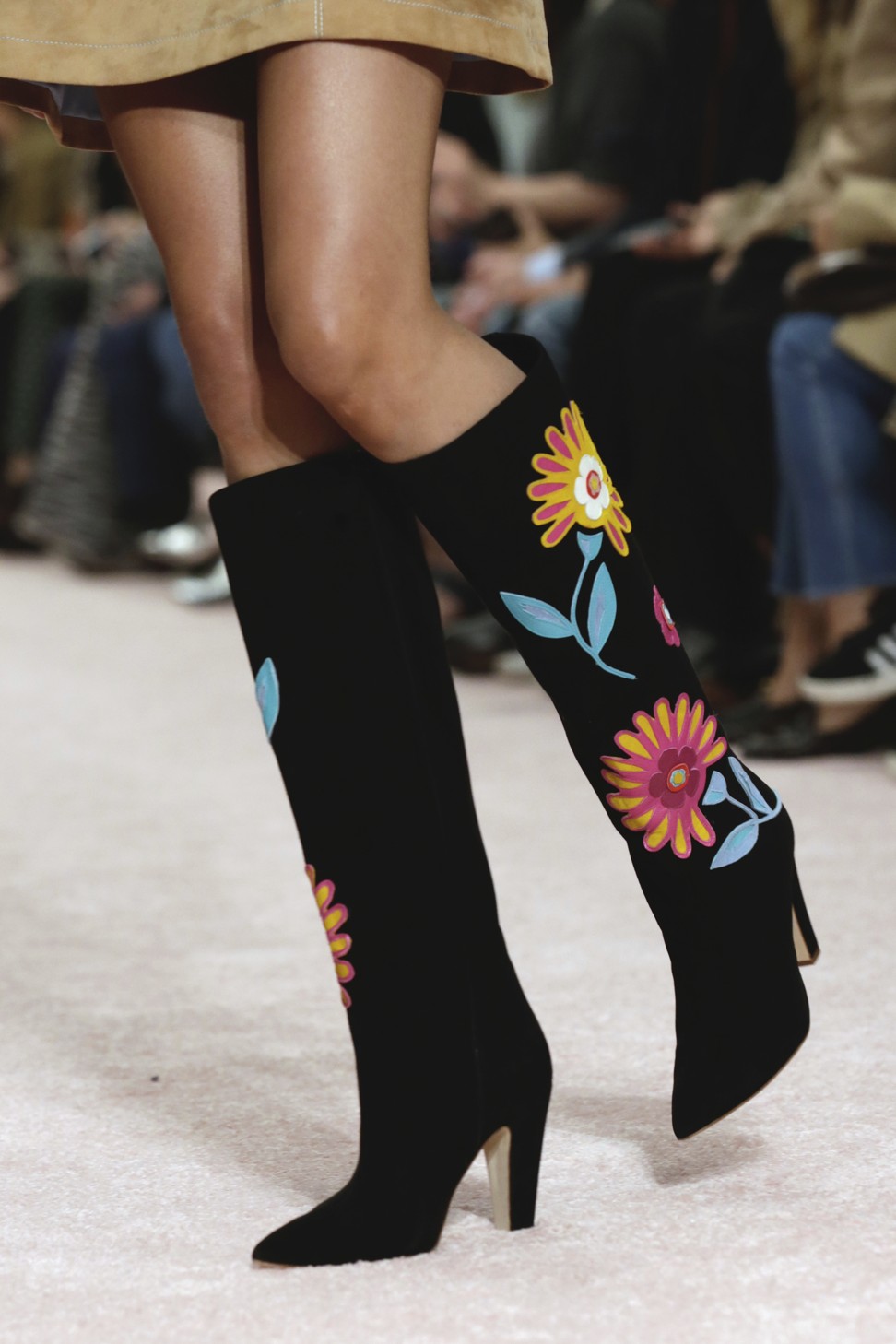 Floral-patterned boots from Carolina Herrera’s spring-summer 2019 collection are modelled on the catwalk during the brand’s show on Monday at New York Fashion Week. Photo: AP