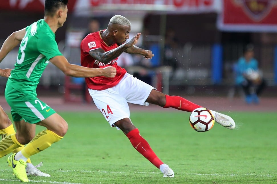 Guangzhou Evergrande’s Anderson Talisca (right) has been in good form this term. Photo: AFP