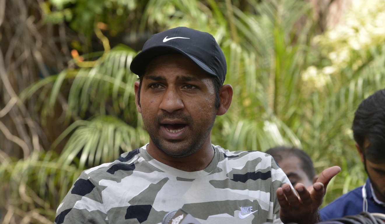 Pakistan captain Sarfraz Ahmed talks to the media in Lahore before leaving for UAE. Photo: AFP