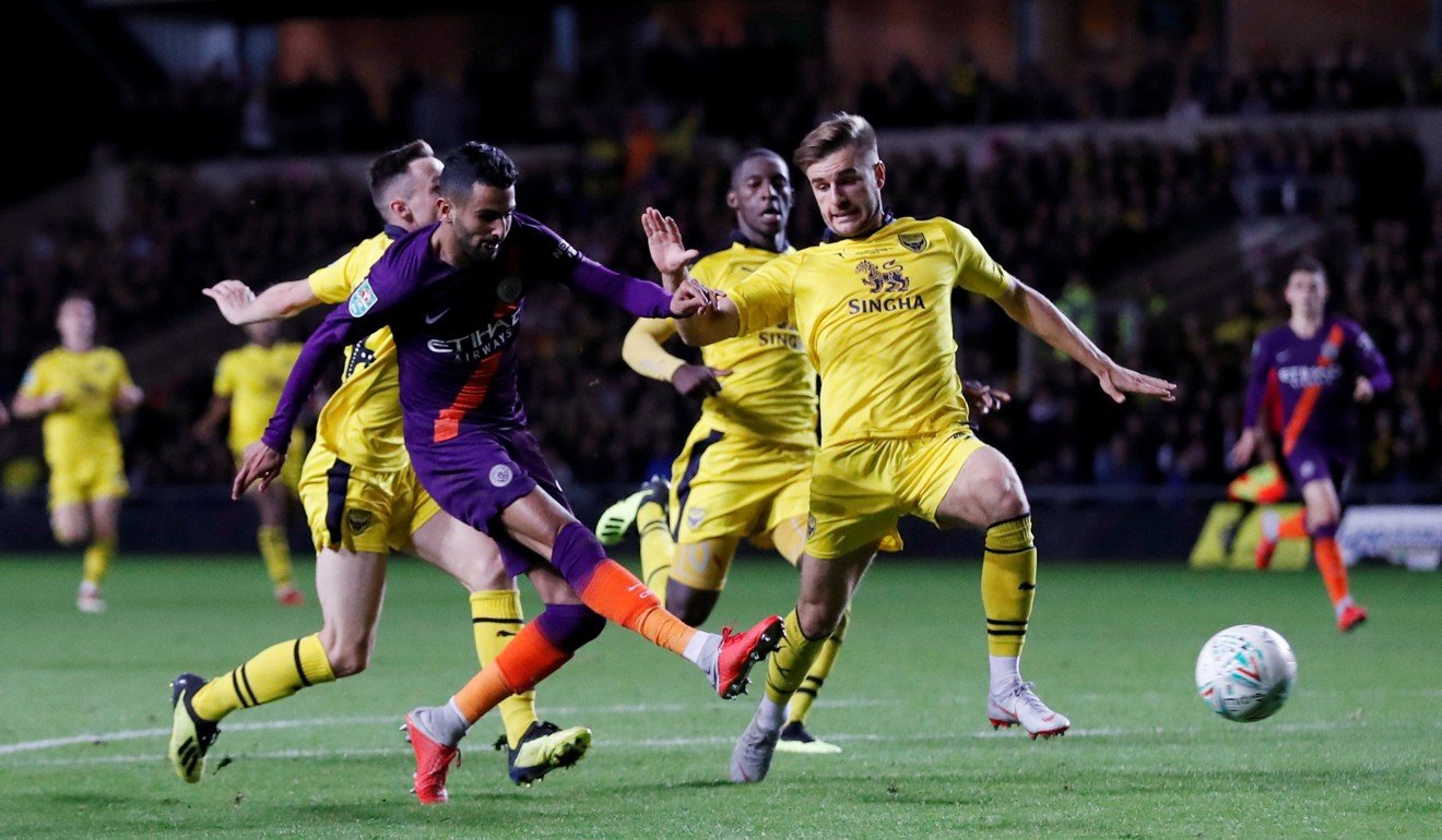 Manchester City’s Riyad Mahrez scores their second goal against Oxford United. Photo: Reuters