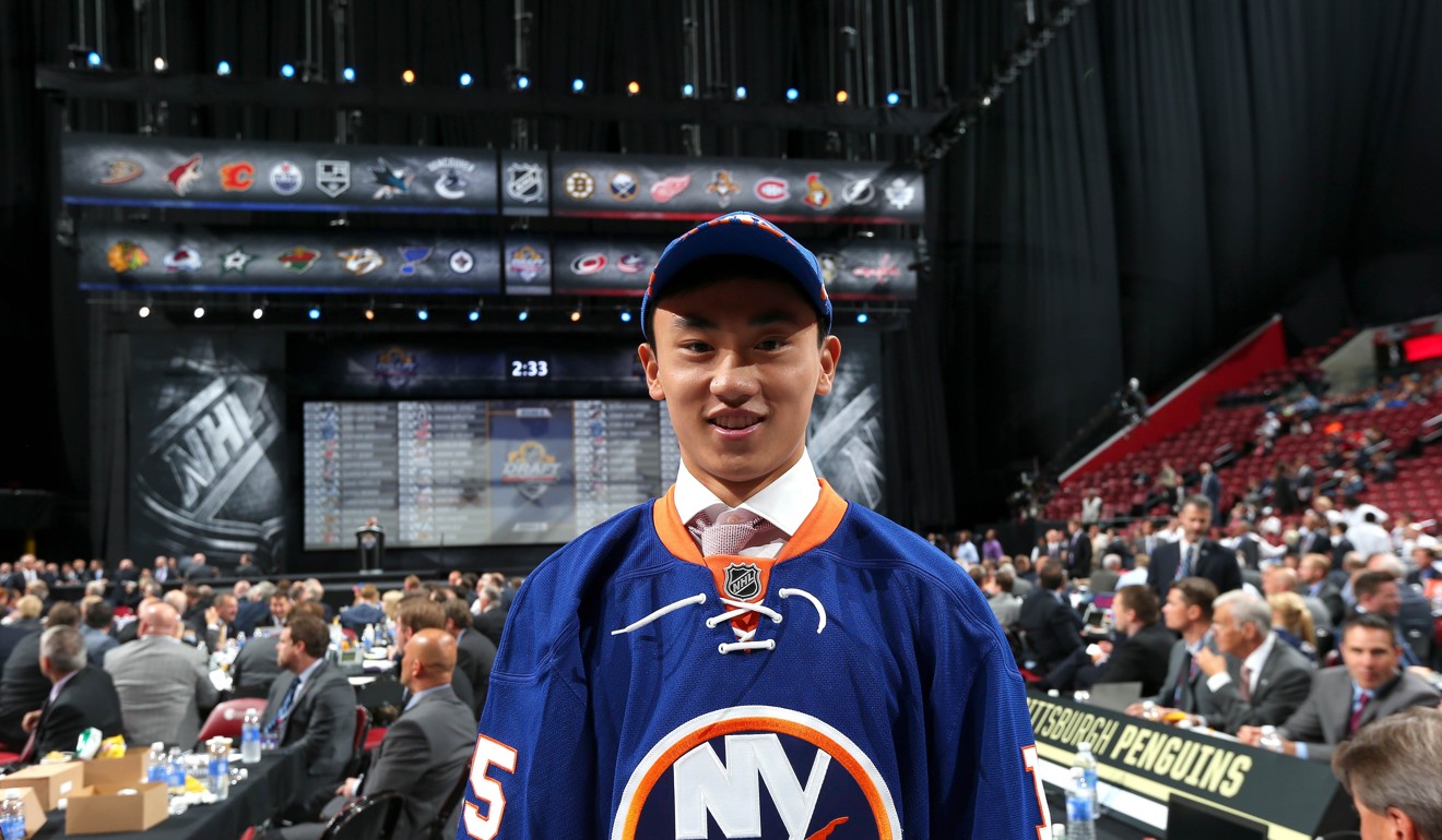 Song Andong reacts after being selected 172nd overall by the New York Islanders. Photo: AFP
