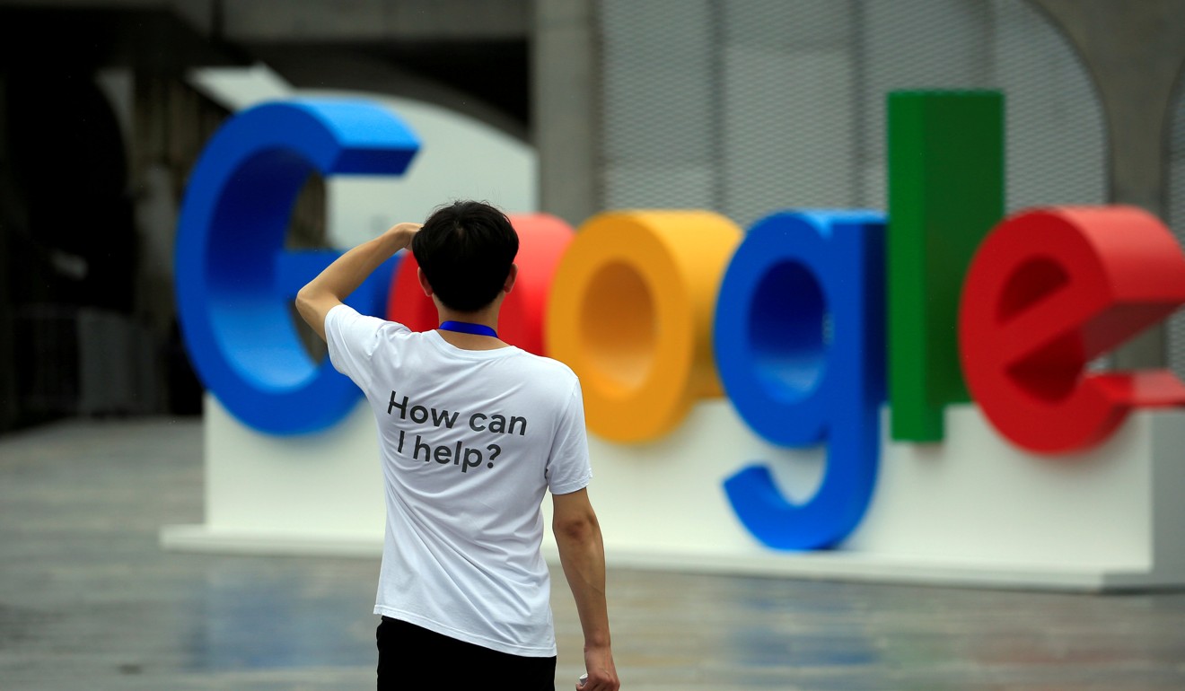 A man stands in front of a Google sign during the World Artificial Intelligence Conference in Shanghai, China, on September 17. Photo: Reuters