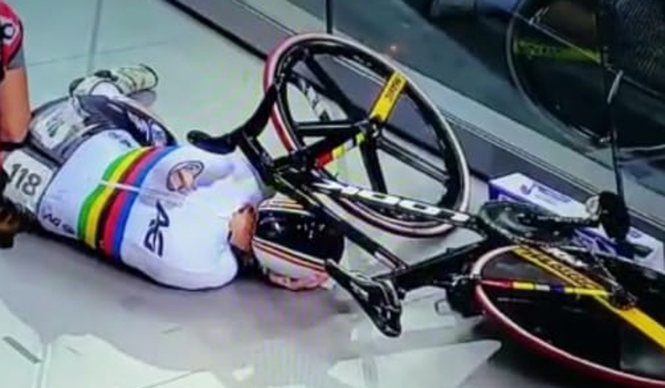 Nicky Degrendele lies motionless after her heavy crash in the keirin final.