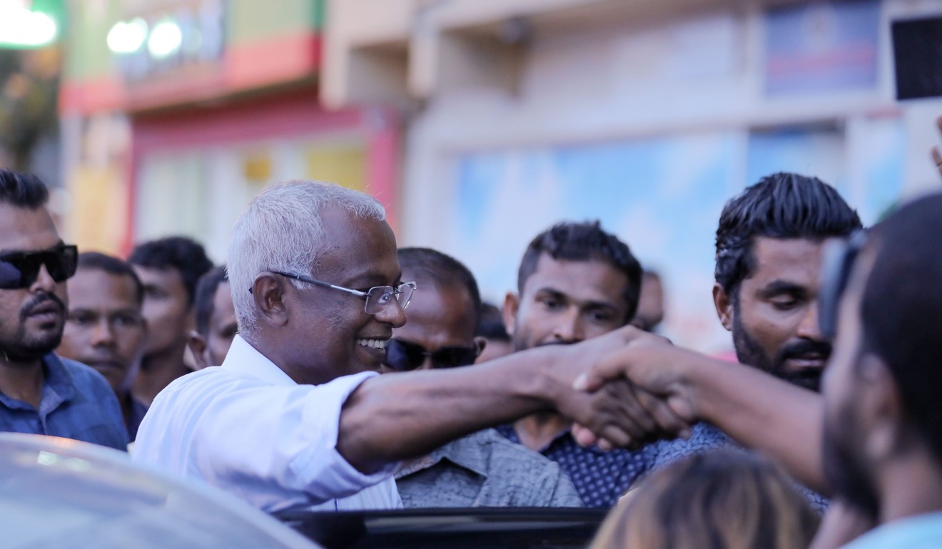 Ibrahim Mohamed Solih greets a crowd after winning Maldives' presidential election in Male. Photo: Male