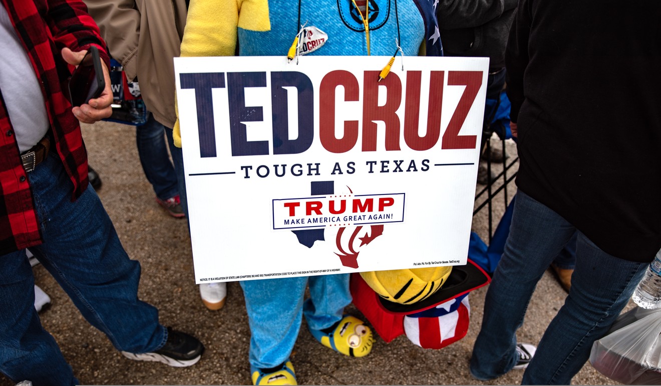 An attendee wears a sign in support of Senator Ted Cruz. Photo: Bloomberg