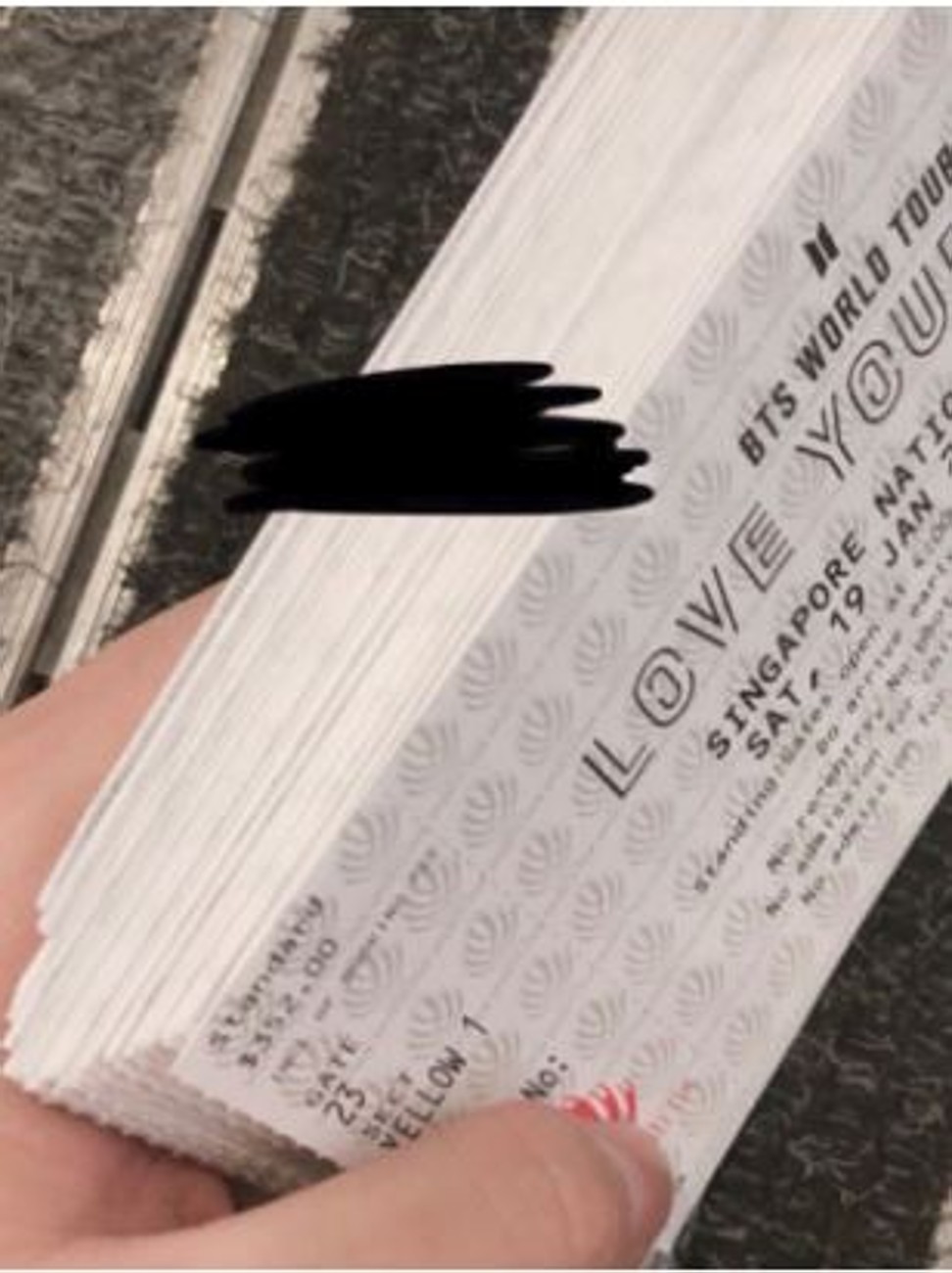A pile of tickets reportedly being offered for resale at inflated prices. Photo: Twitter/minajoons