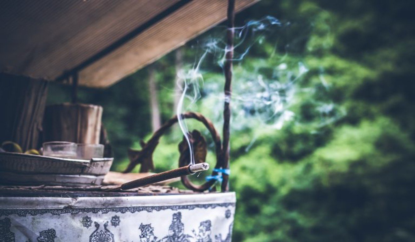 Incense sticks burning in a Bali temple. Some say the curse only affects couples who visit the famous Tanah Lot Temple. Photo: Artem Bali/Unsplash