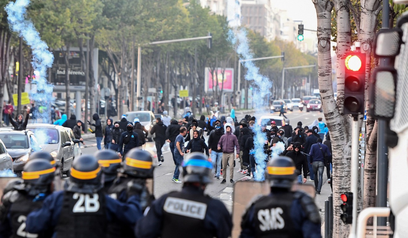 Heavy-handed policing often serves to heighten the tension among travelling supporters. Photo: AFP