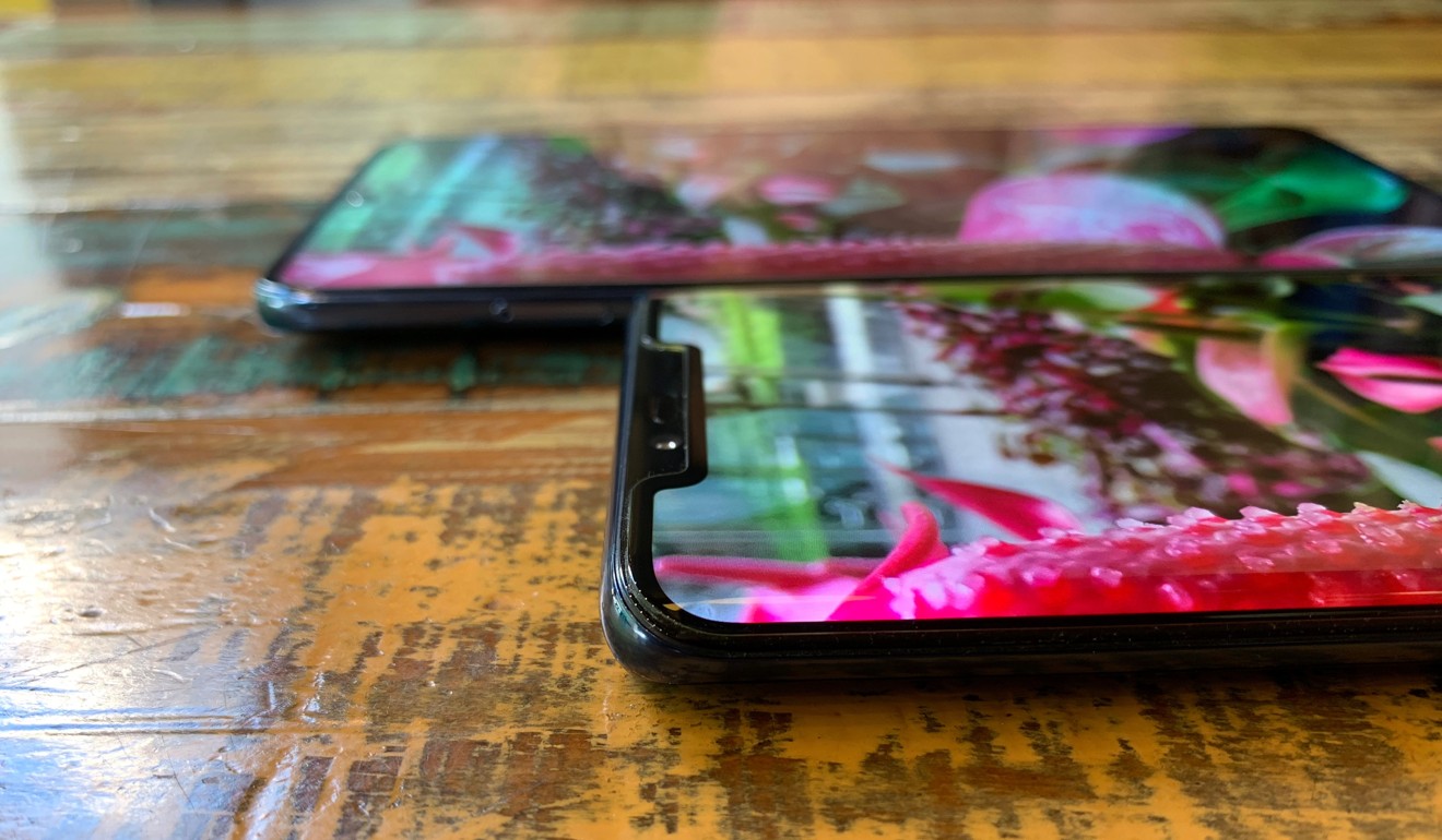 The Huawei Mate 20 Pro’s curved display (front) next to the flat panel of the X. Photo: Ben Sin