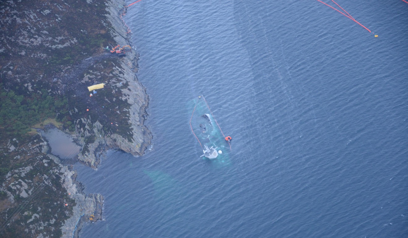 The sinking Norwegian navy frigate in Oygarden, Norway on November 13, 2018. Photo: Reuters