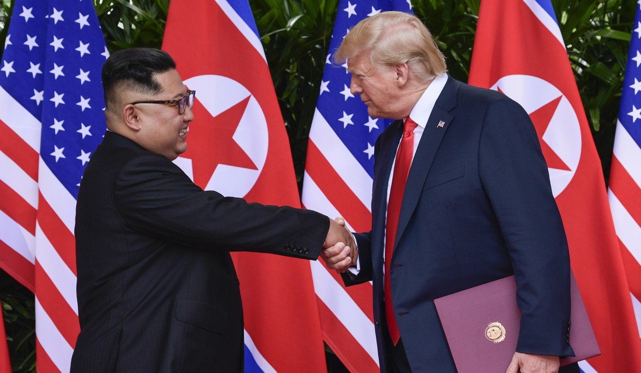 In this June 12, 2018, file photo, North Korean leader Kim Jong-un shakes hands with US President Donald Trump at the conclusion of their meetings at the Capella resort on Sentosa Island in Singapore. Photo: AP