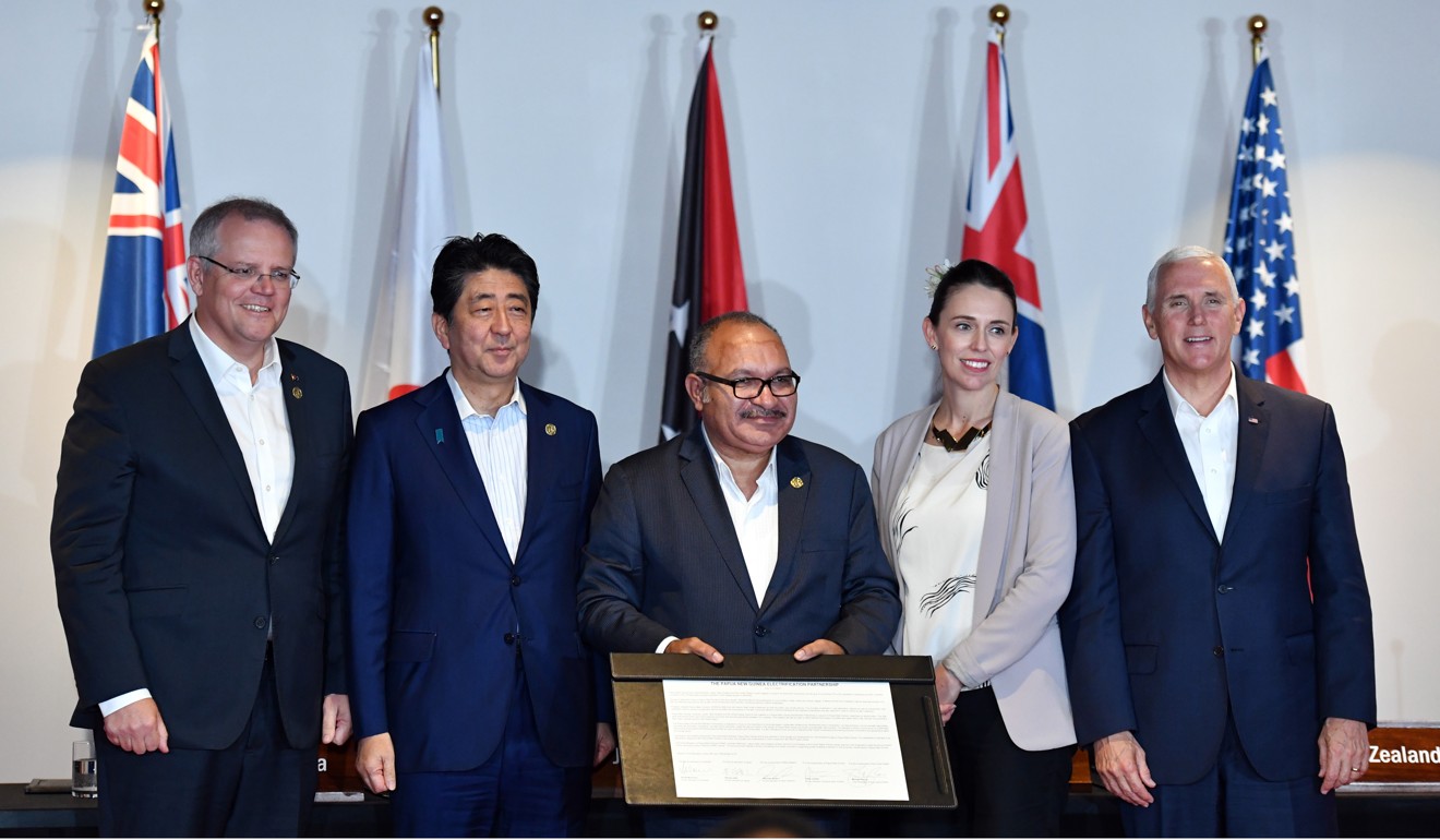 From left: Australia’s Prime Minister Scott Morrison, Japan’s Prime Minister Shinzo Abe, Papua New Guinea Prime Minister Peter O’Neill, New Zealand’s Prime Minister Jacinda Ardern and US Vice-President Mike Pence make an energy and communications statement at the Apec forum in Port Moresby, Papua New Guinea on November 18, 2018. Photo: EPA