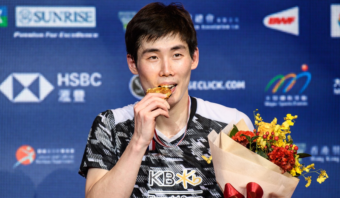 South Korea’s Son Wan-ho celebrates winning the men’s singles final. Photo: AFP