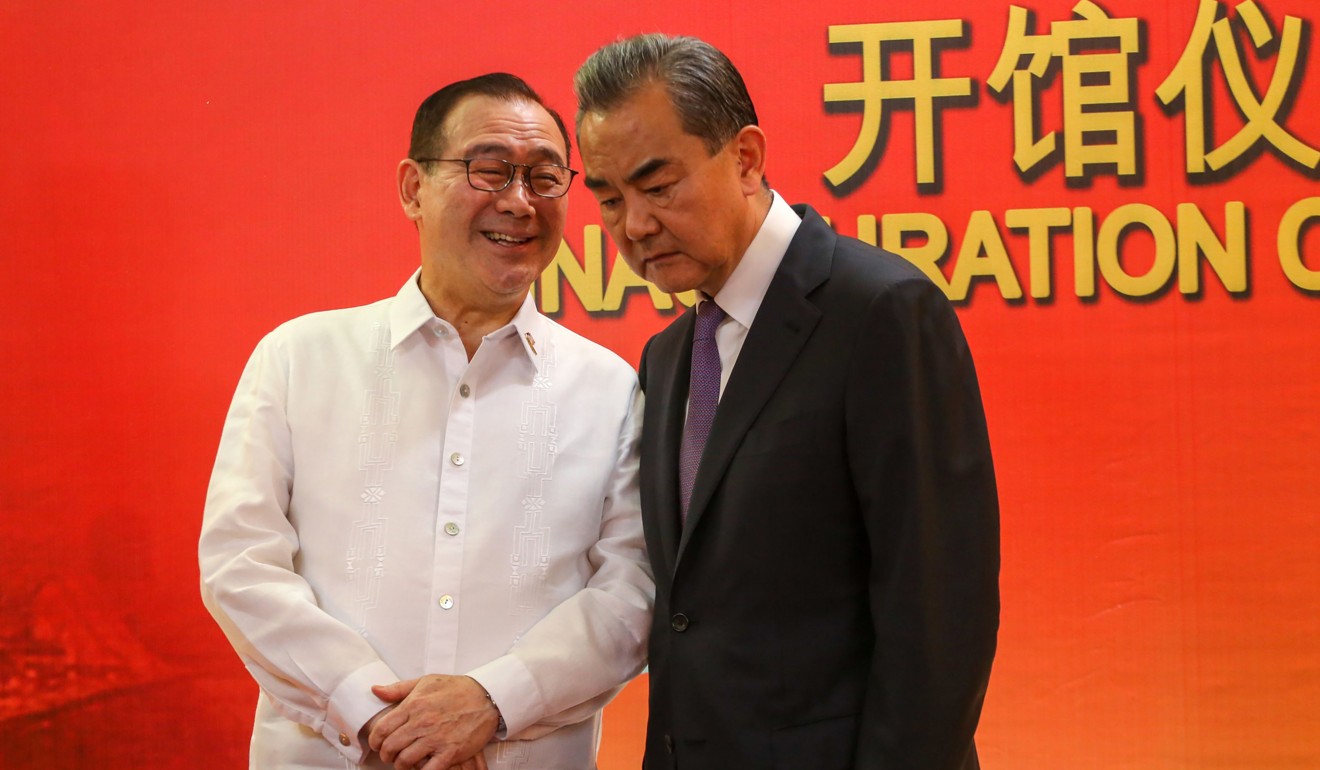 Chinese Foreign Minister Wang Yi made (right), pictured with Philippine Secretary of Foreign Affairs Teodoro Locsin Jnr, described Duterte as an important friend to the Chinese people. Photo: AFP