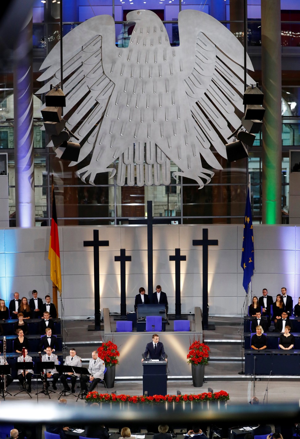 French President Emmanuel Macron gives a speech during a ceremony at the lower house of parliament Bundestag in the Reichstag building in Berlin to mark National Mourning Day. Photo: Reuters