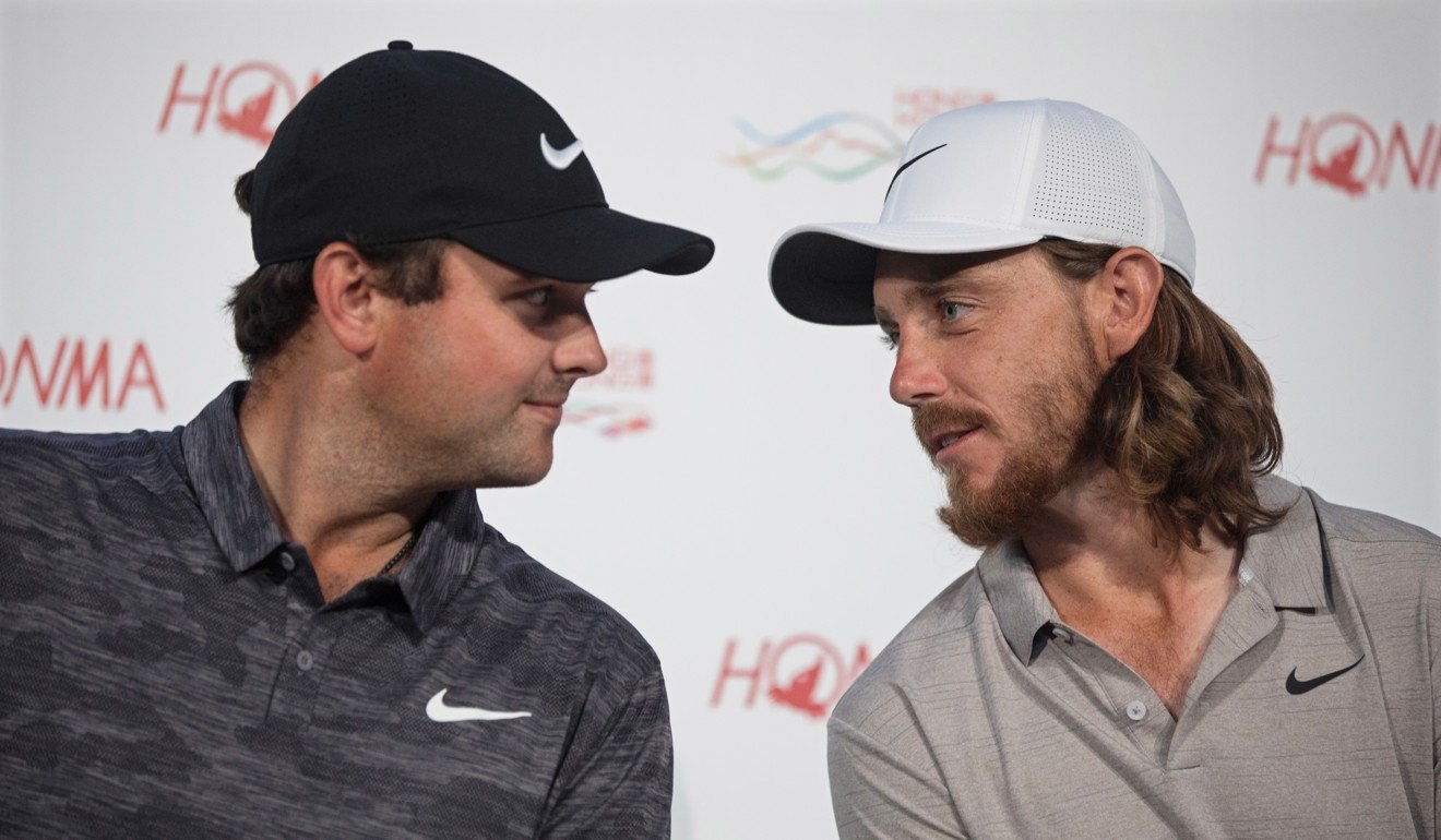 Patrick Reed and Tommy Fleetwood chat during a press conference for the Hong Kong Open. Photo: EPA