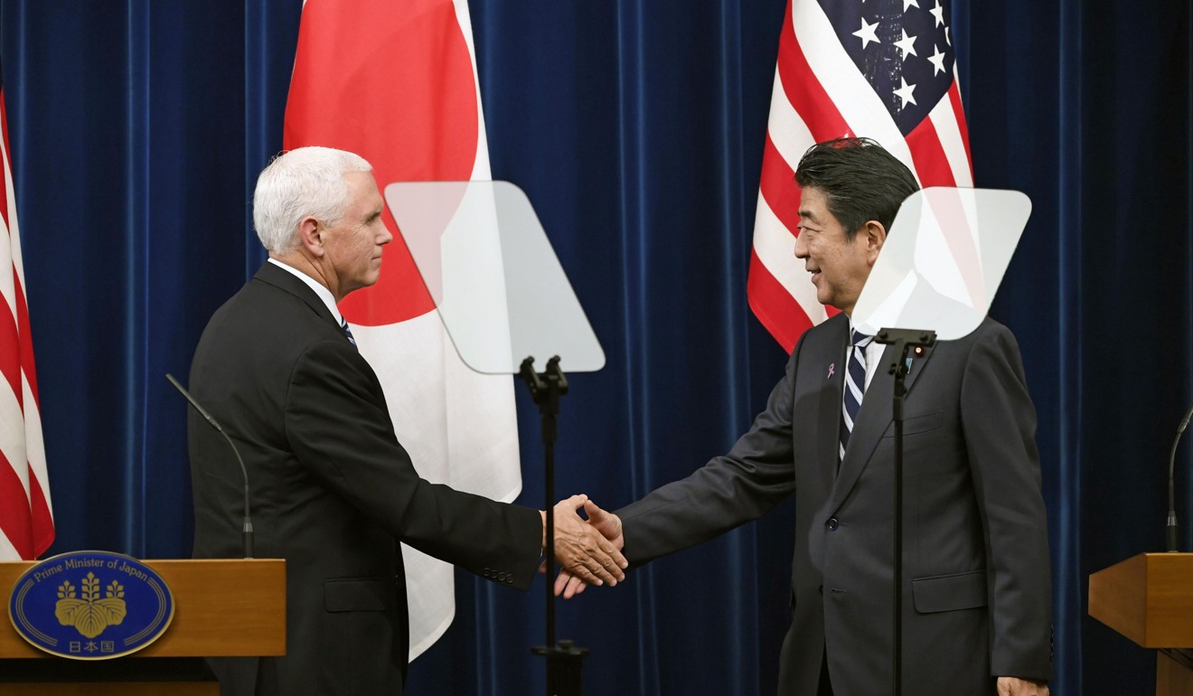 US Vice-President Mike Pence and Japanese Prime Minister Shinzo Abe shake hands after a joint press conference in Tokyo on November 13. Japan, and Abe in particular, has been quick to embrace the Indo-Pacific concept. Photo: Kyodo
