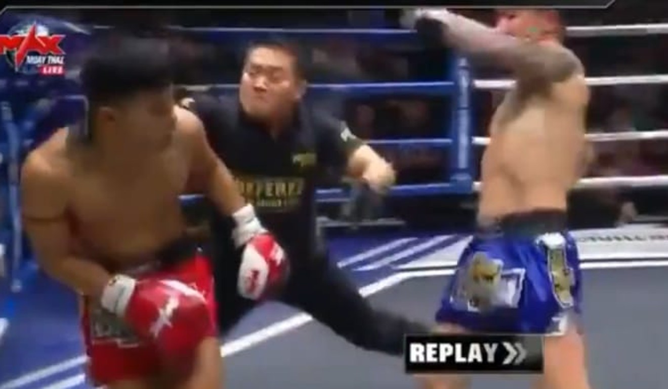 The referee gets into Gou Dakui’s line of fire moments before getting knocked out in the second round.