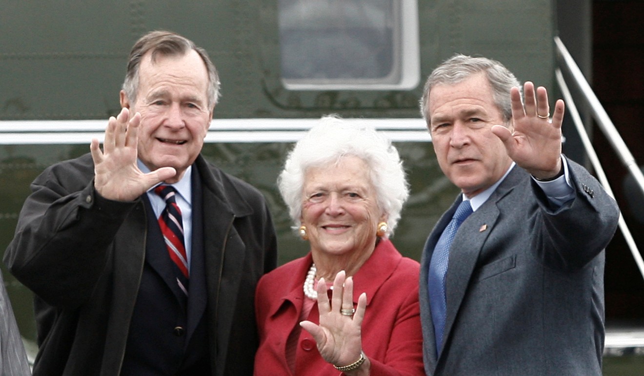 Former President George H.W. Bush with wife Barbara and son George W. Bush. Photo: Reuters