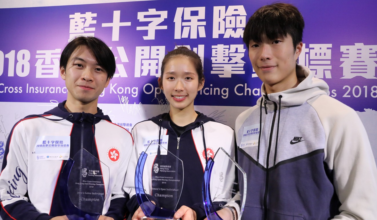 lam Jethro, Vivian Kong and Cheung Ka-long with their trophies at the Hong Kong Open.