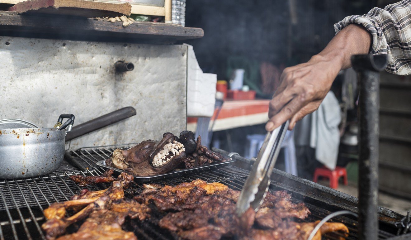 A dog meat street stall, in Phnom Penh, Cambodia. Photo: Enric Catala