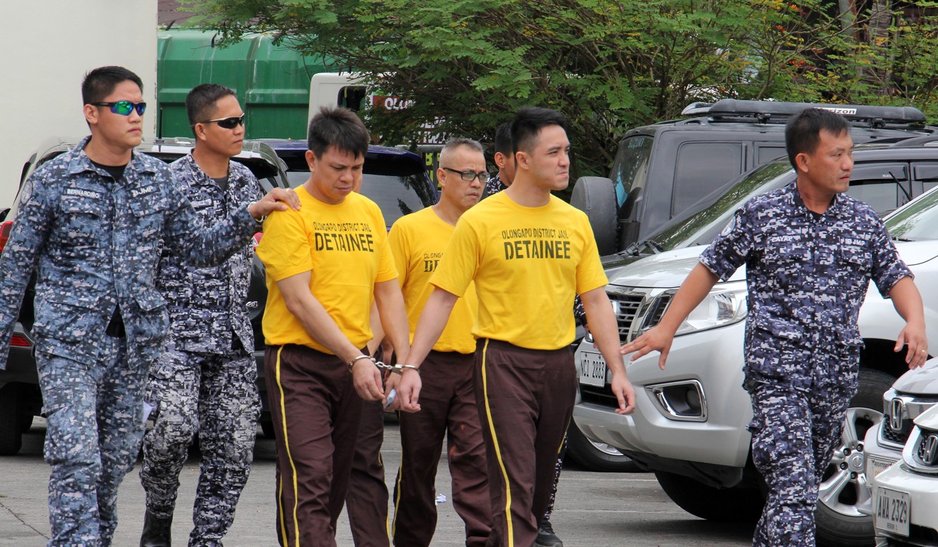 The men went on trial in Olongapo city, a four-hour drive from Manila. Photo: EPA