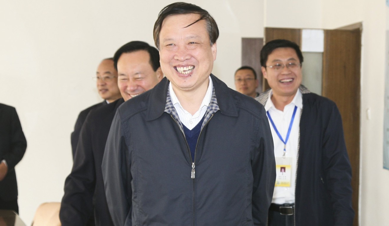 Zhang Jianmin (centre) was appointed director of the State Tobacco Monopoly Administration. Photo: Nmgztb.com