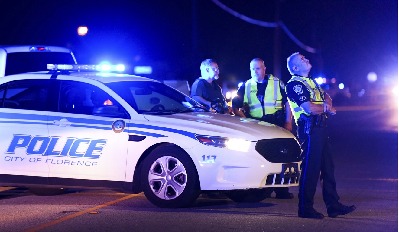 Police redirect traffic in Florence, South Carolina, after several officers were shot, one fatally, on October 3, 2018. Photo: AP