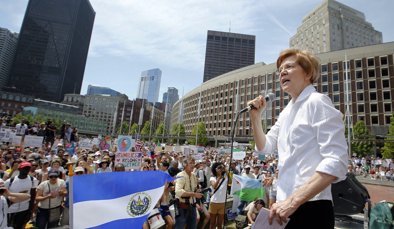 Warren speaking at a rally in Boston in June. Photo: AP