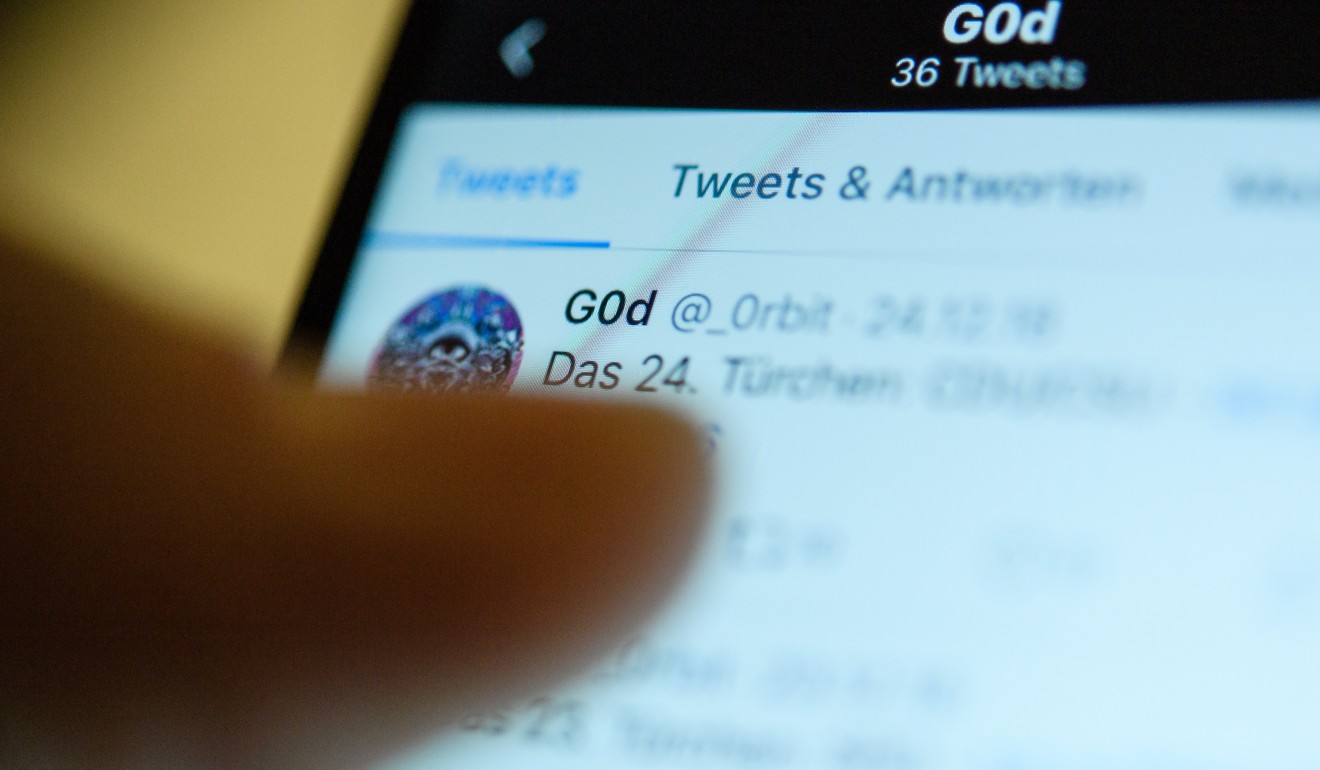 A close-up view of the Twitter account 'G0d' (@_0rbit) in Berlin, Germany, 04 January 2019. Photo: EPA-EFE/CLEMENS BILAN