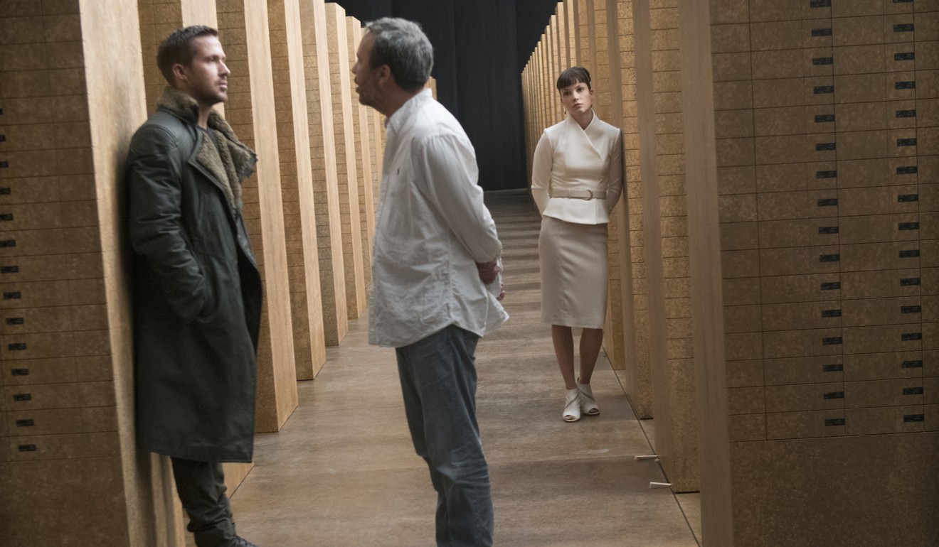 From left: Ryan Gosling, director Denis Villeneuve and Sylvia Hoeks on the set of Blade Runner 2049.