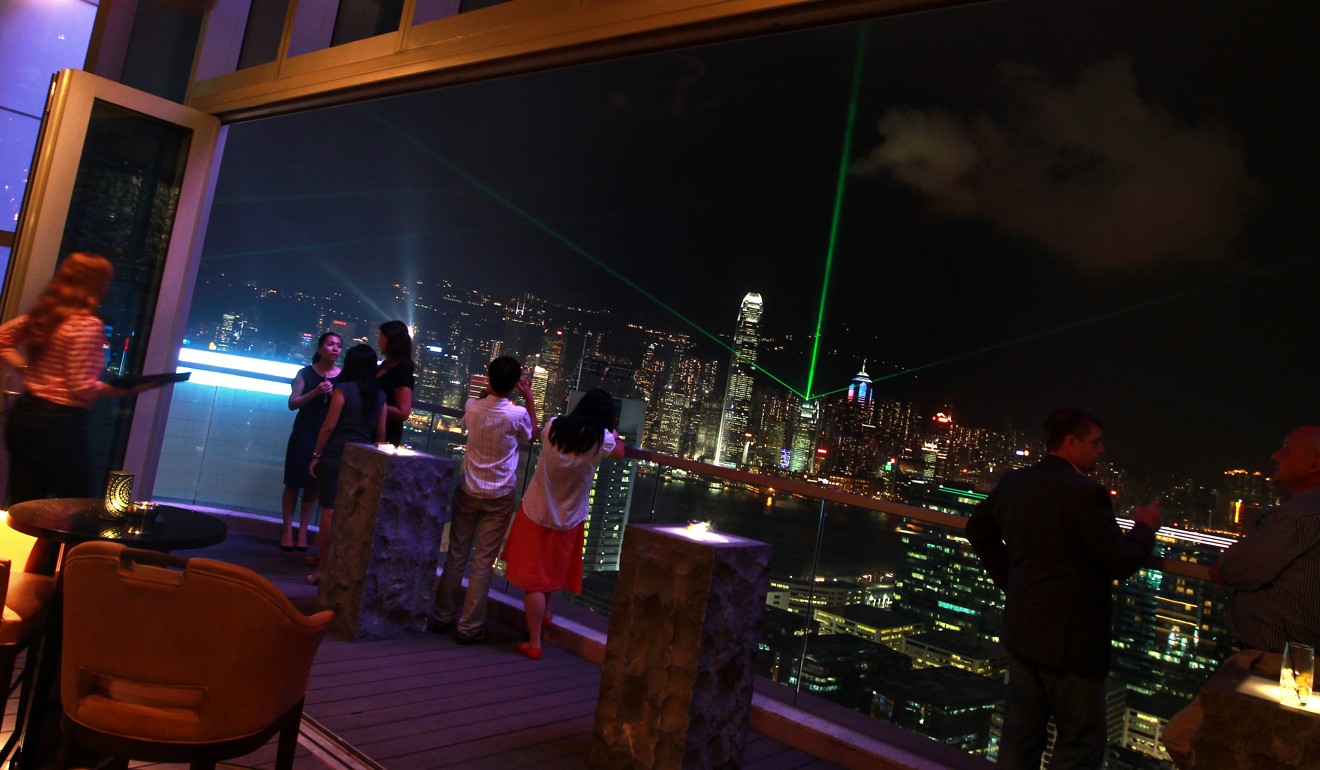 The view across Victoria Harbour from Wooloomooloo Prime in Tsim Sha Tsui. Photo: Jonathan Wong