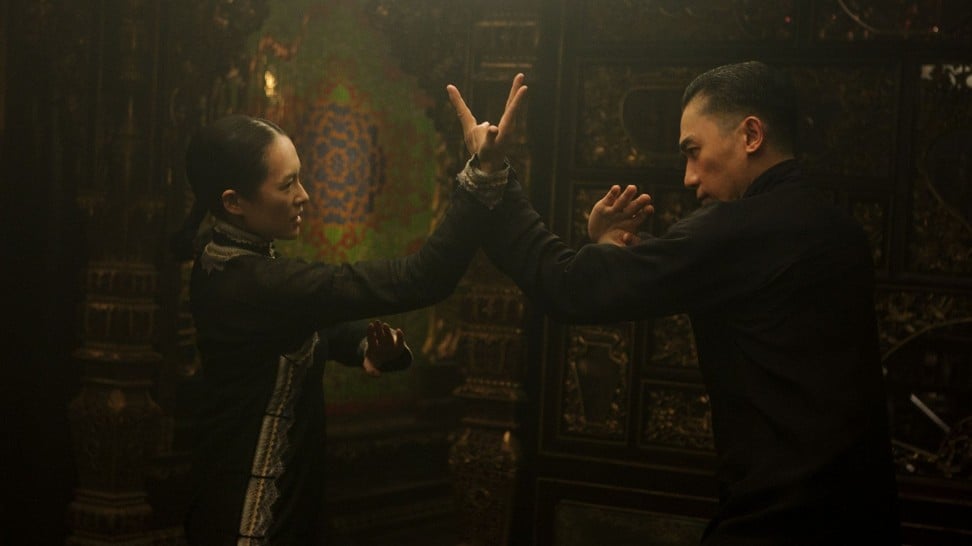 Gong Er (left) played by Zhang Ziyi, fights Ip Man (Tony Leung) in ‘The Grandmaster’.