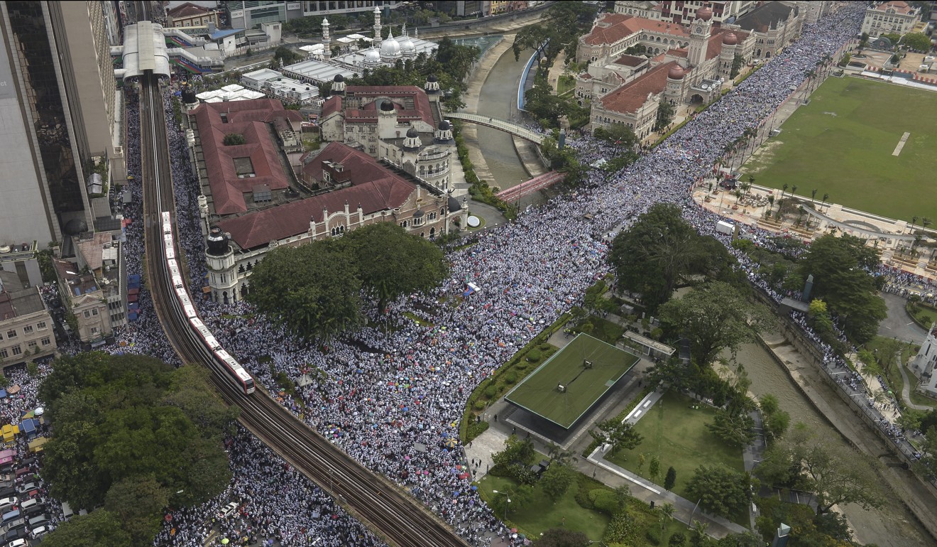An aerial shot of the thousands of people in Kuala Lumpur who took part in rally against a UN anti-discrimination convention. Photo: EPA