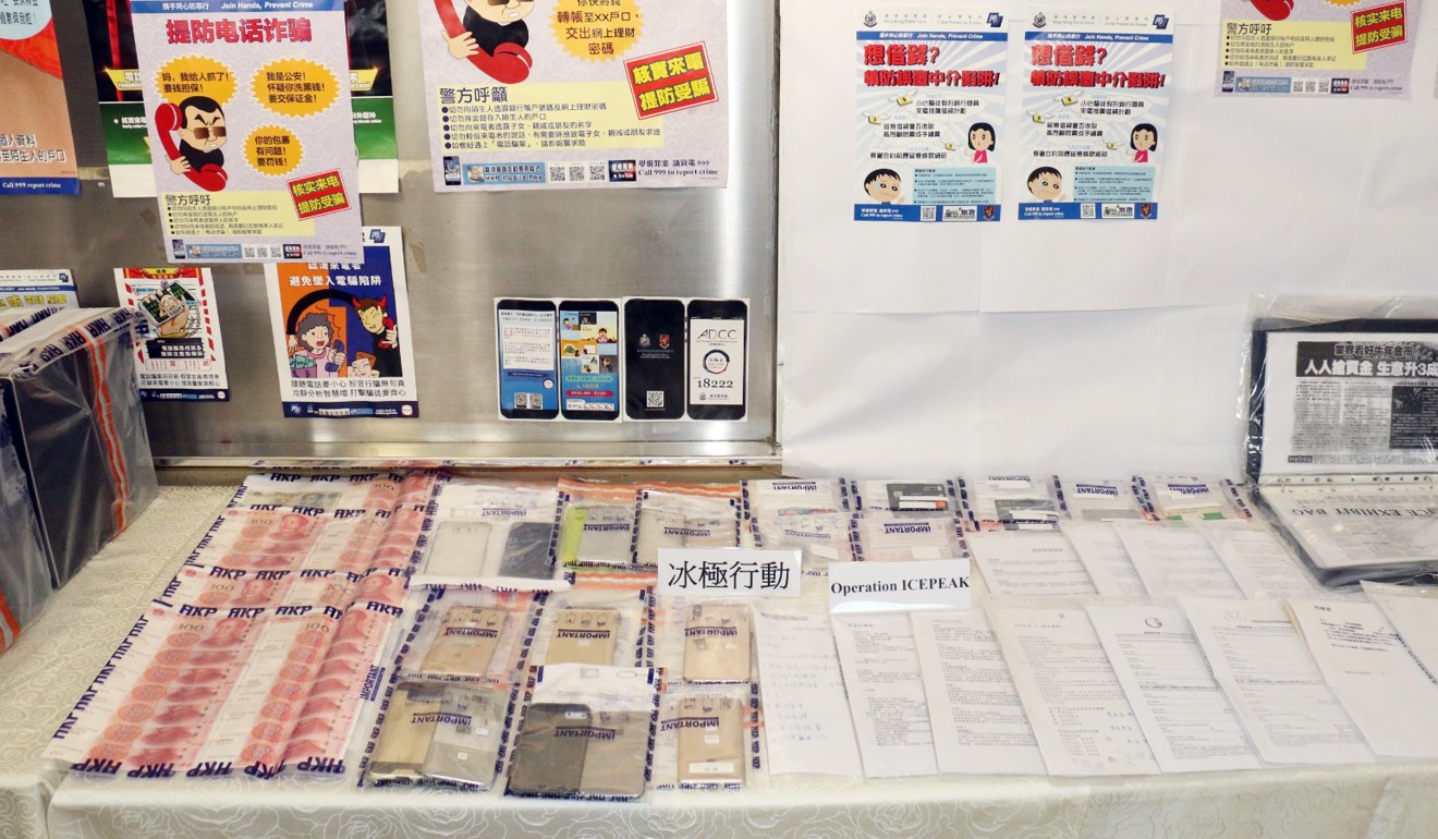 Picture of items including cash and computers seized by investigators. Photo: Handout