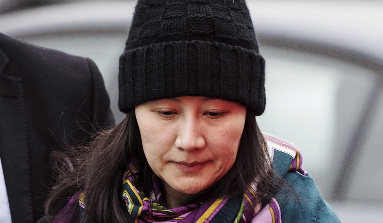 In this December 12, 2018, file photo, Huawei chief financial officer Meng Wanzhou arrives at a parole office with a security guard in Vancouver, British Columbia. Photo: AP
