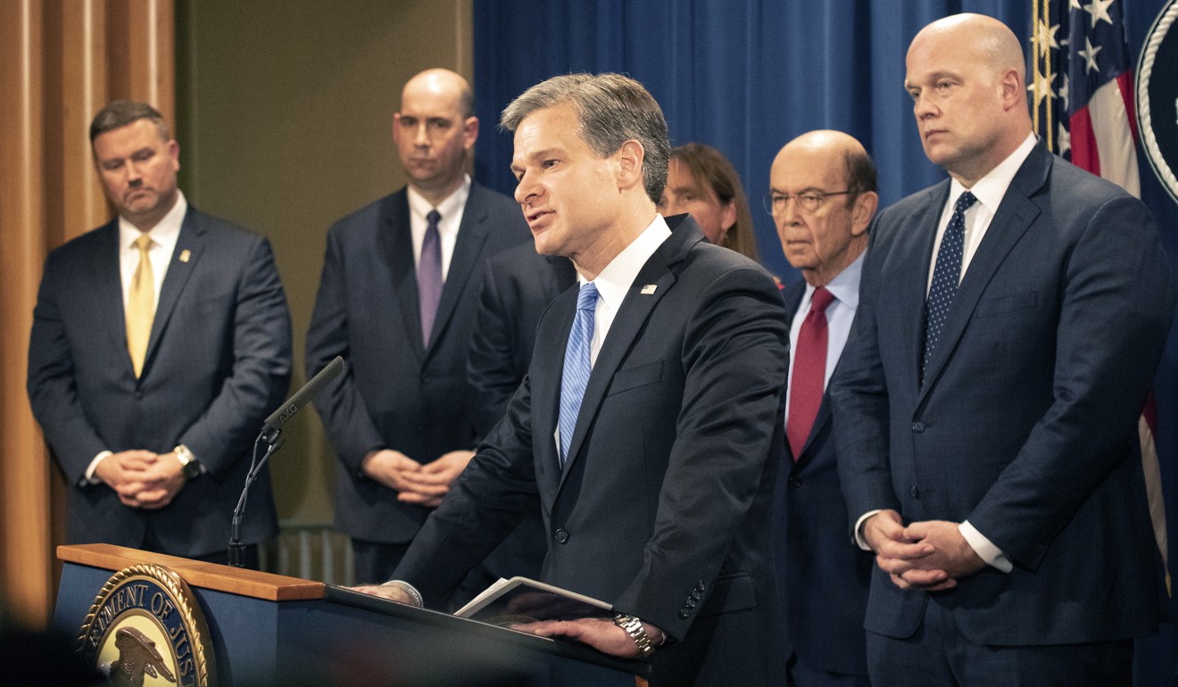 FBI director Christopher Wray speaks at a press conference announcing an indictment against Huawei on Monday. Photo: Bloomberg