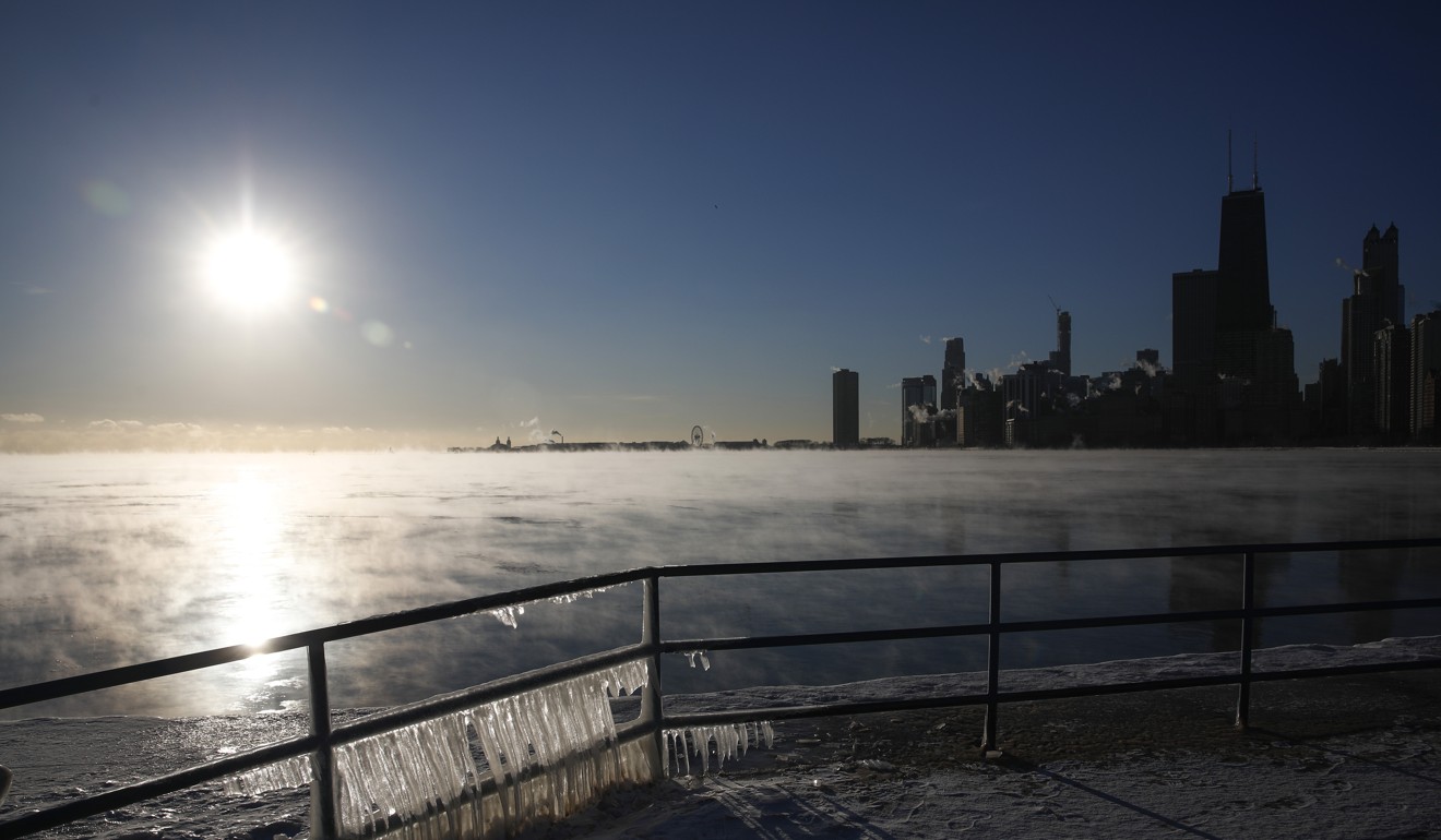 Icicles form on a railing along the Chicago lakefront. Photo: AP