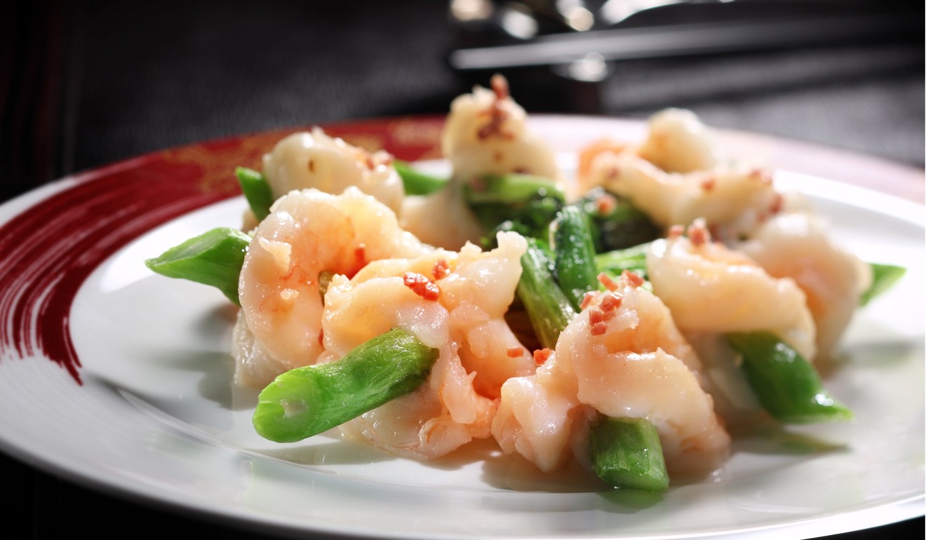 Tin Lung Heen restaurant’s skewed prawns with Jin Hua ham and vegetables.