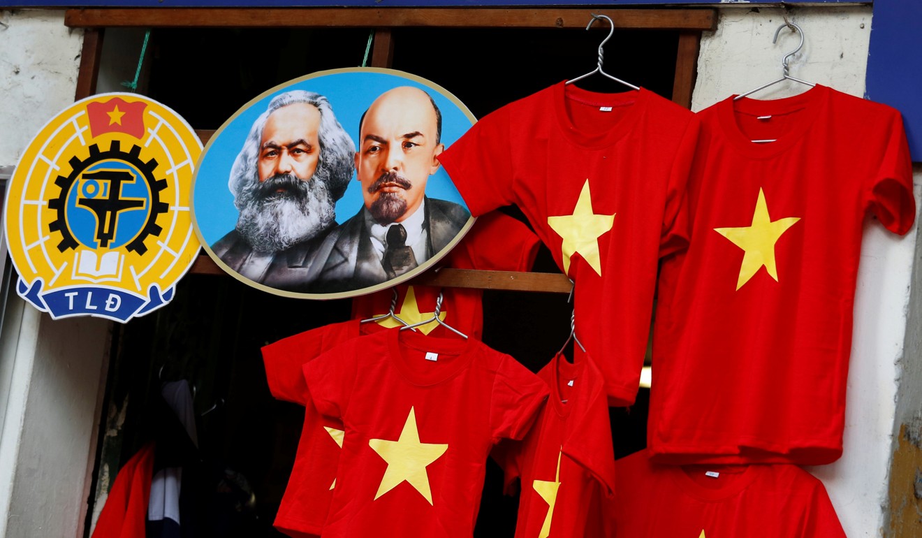Images of the revolutionary icons Karl Marx and Vladimir Lenin at a shop in Hanoi. Photo: Reuters