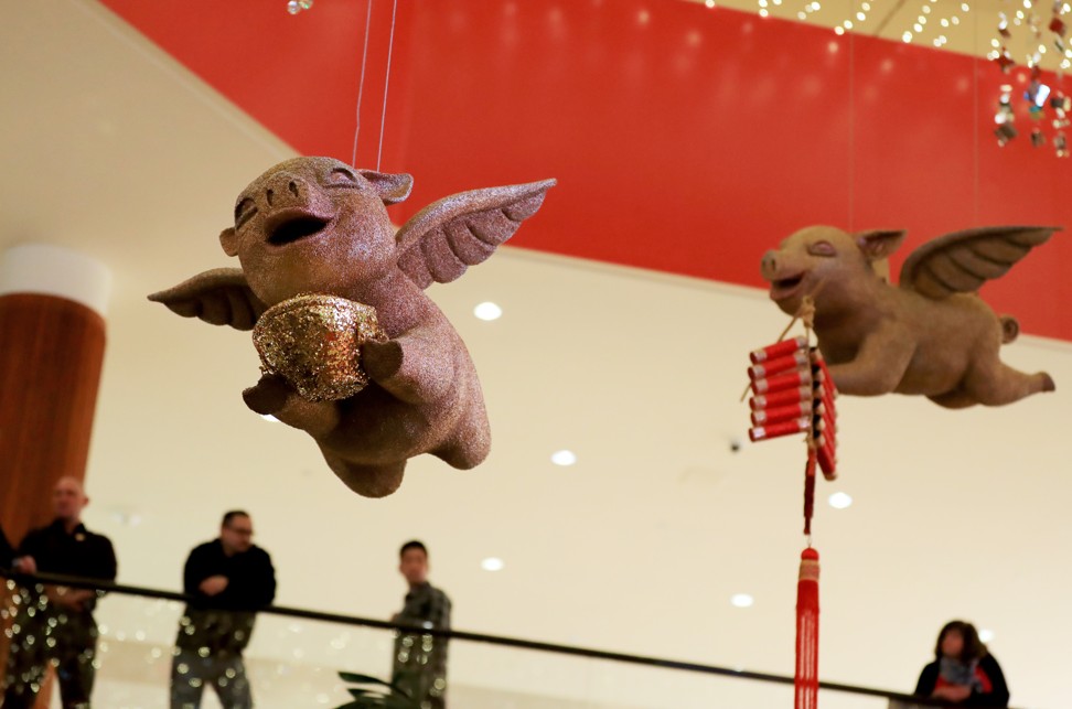 Decorations of the Year of the Pig are seen at a Lunar New Year celebration, at South Coast Plaza in Costa Mesa, California. Photo: Xinhua