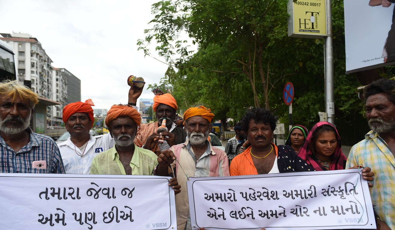 Indian members from the Vaadi community participate in a protest in support of Shantadevi Nath, who was killed by a mob that falsely believed she was intent on abducting children. Photo: AFP