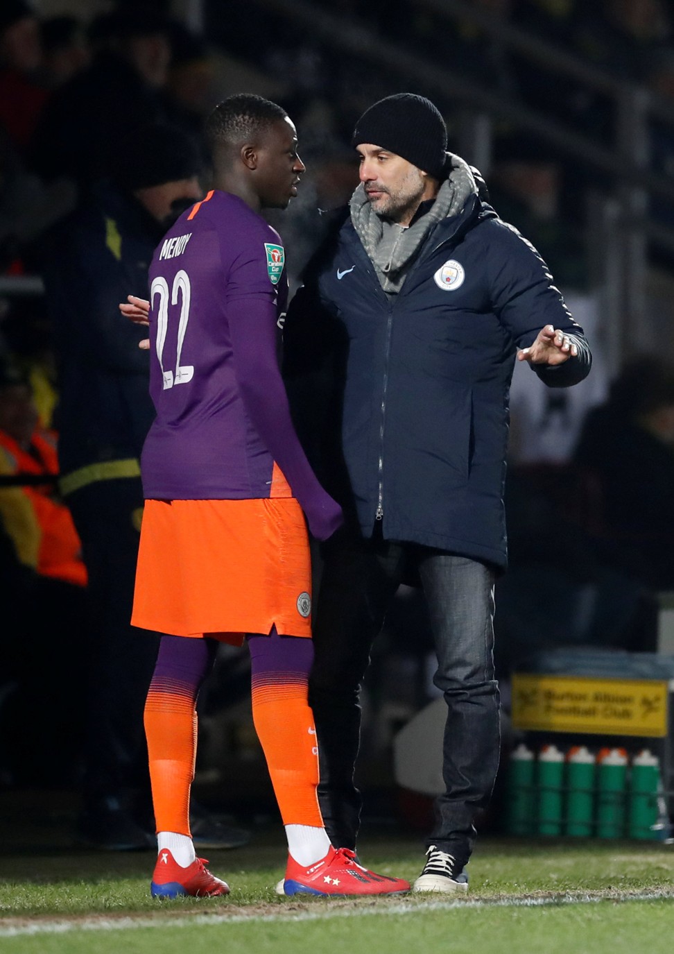 Manchester City manager Pep Guardiola prepares to bring on Manchester City’s Benjamin Mendy as a substitute at Burton Albion. Photo: Reuters