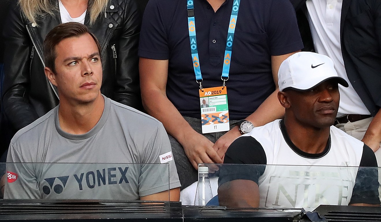 Sascha Bajin (left) is seen in the player’s box during the Australian Open final between Naomi Osaka and Petra Kvitova. Photo: EPA