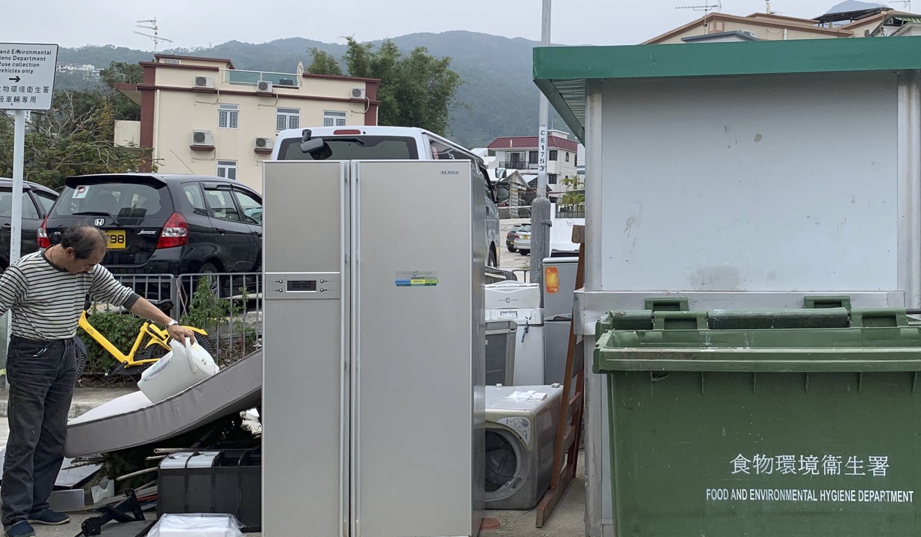 A fridge among piled up items at a collection point in Sai Kung. Photo: May Tse