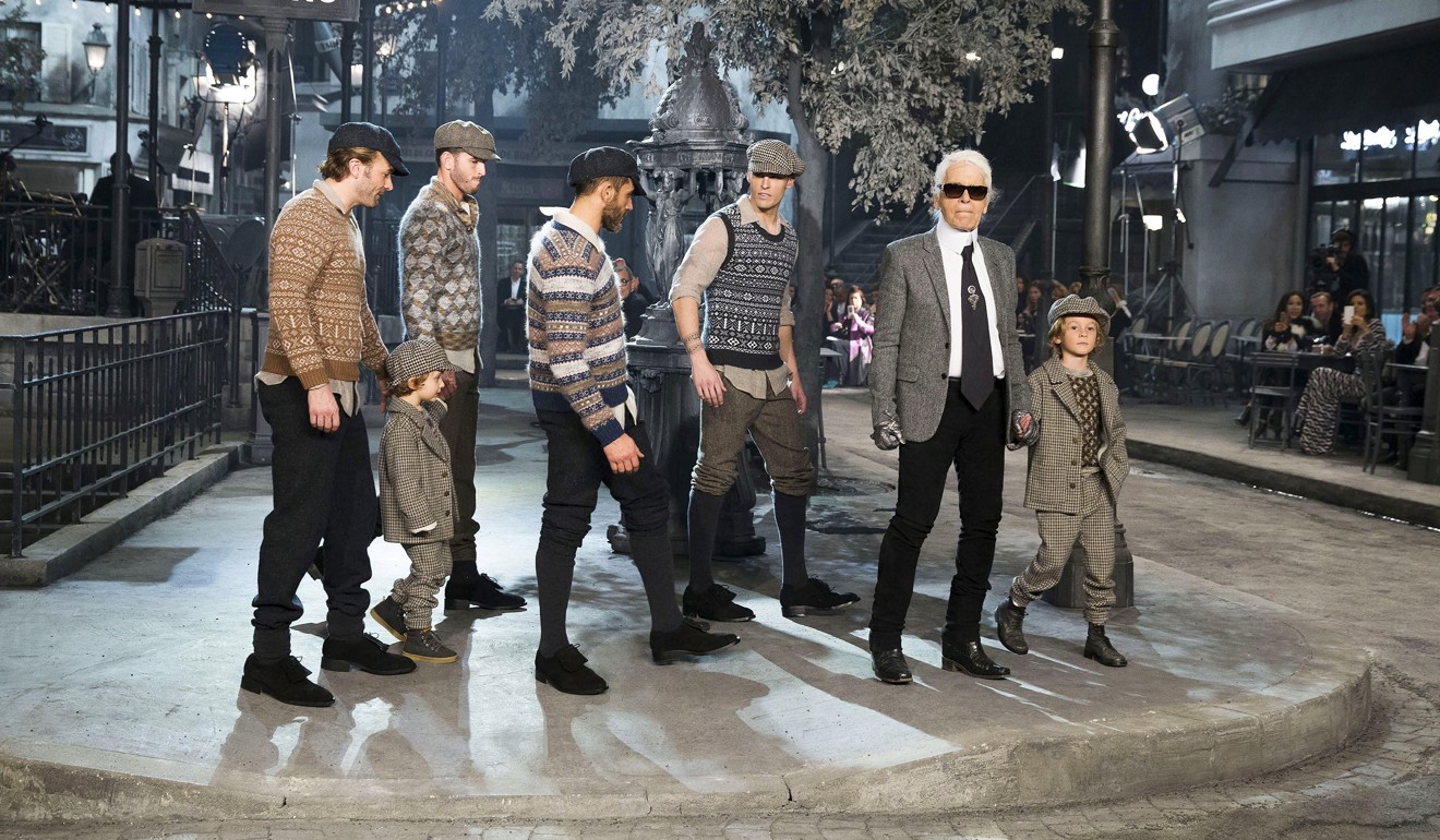 German designer Karl Lagerfeld (second right) pictured in December 2015 at the end of the Chanel Metier d'Art show at Cinecitta studios in Rome. Photo: Reuters