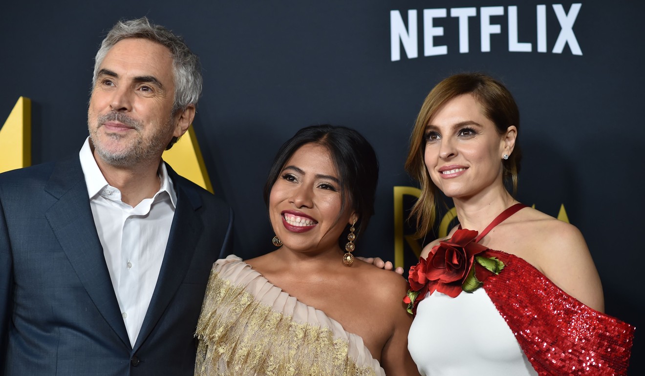 Mexican director Cuarón, Aparicio, and actress Marina de Tavira arrive for the Los Angeles premiere of Roma at the Egyptian theatre in Hollywood, California. Photo: AFP